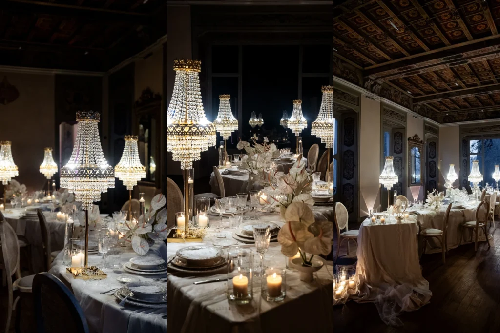 Tavoli matrimonio 2026: mise en place con cristalli, anthurium bianchi, candele e lampadari da tavolo in villa storica